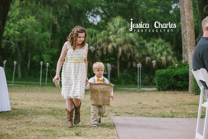 Flowergirl and ringbearer walk down the aisle for the ceremony