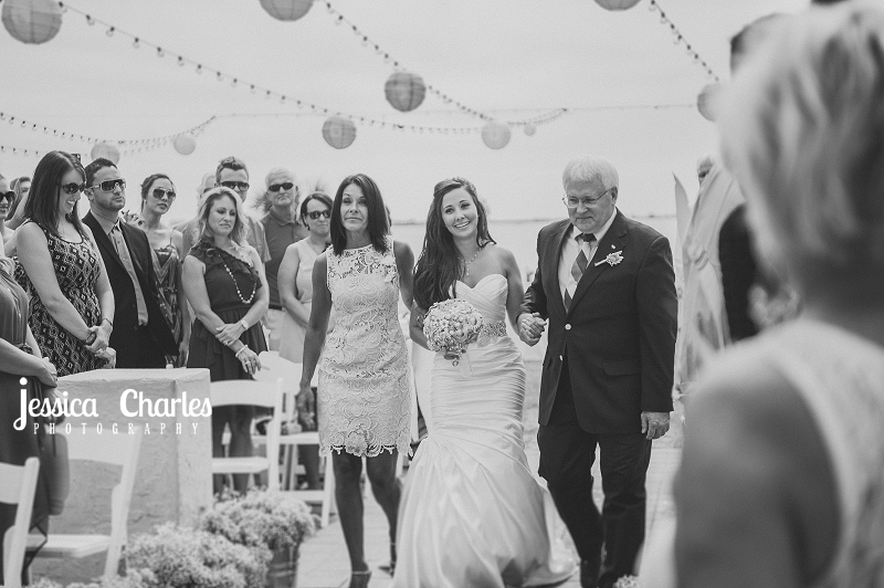 Bride's parents walk her down the aisle at the Powel Crosley Estate