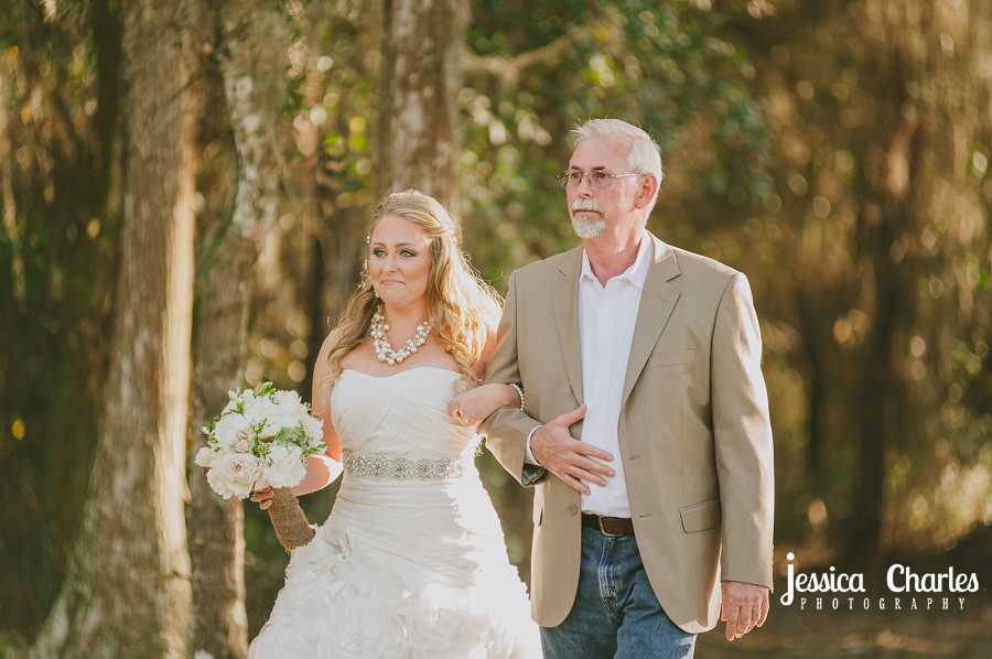 Bride walking down the aisle with her dad